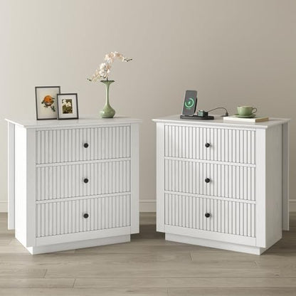 24" wide white fluted nightstand with 3 drawers, front angle view