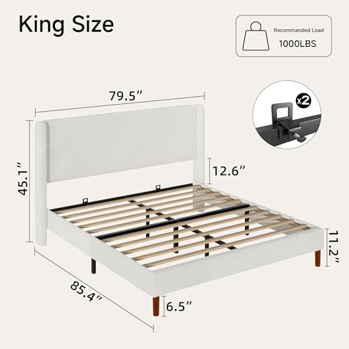 king bed frame, boucle upholstered platform bed with shown in use