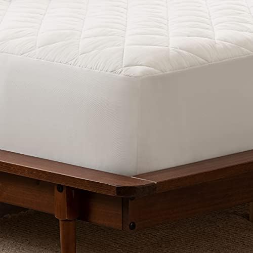 serta power clean triple action waterproof mattress pad shown in use