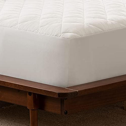 serta power clean triple action waterproof mattress pad shown in use
