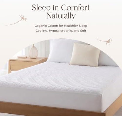 whisper organics 100% cotton organic quilted mattress pad on a desk or shelf