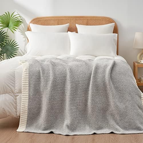 snuggle sac buttery grey throw blanket for couch on a desk or shelf