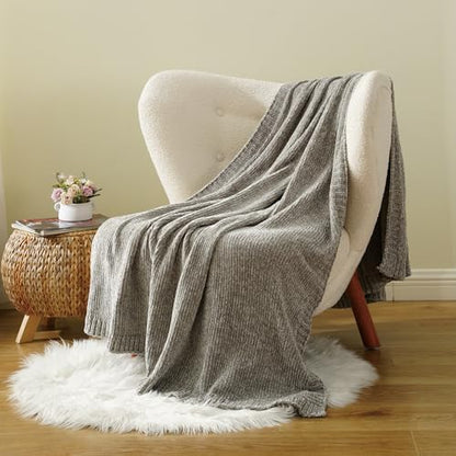 chenille throw blanket for couch sofa, light grey on a desk or shelf