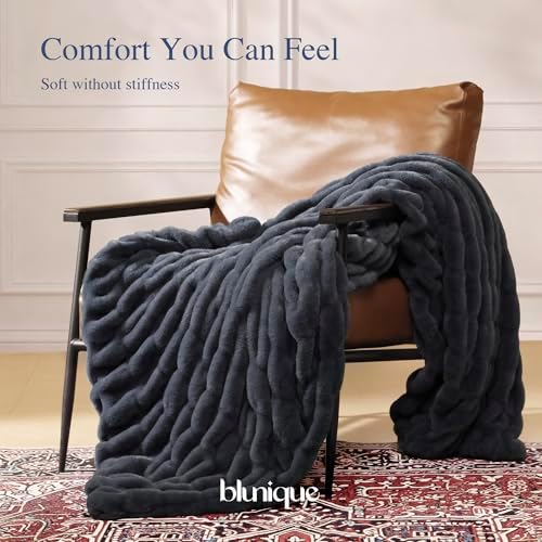 double-sided faux fur throw blanket, 1000 gsm ultra on a desk or shelf