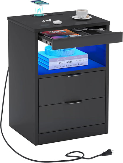 adorneve black led nightstand with wireless charging station shown in use