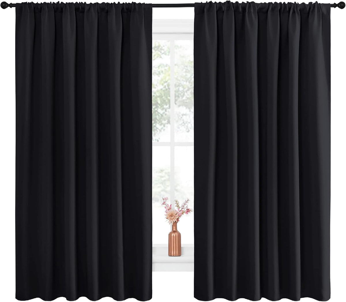 nicetown black blackout curtains for bedroom 70" wide shown in use