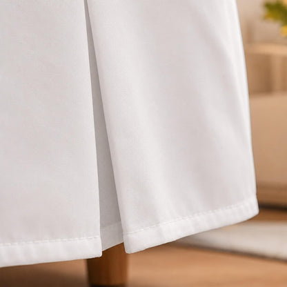 arlinen pleated full bed skirt with split corners on a desk or shelf