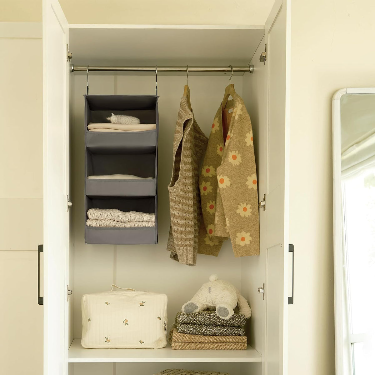 granny says 3-shelf hanging closet organizer, foldable storage, front angle view