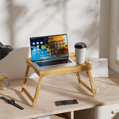 artmeer adjustable bamboo bed tray table with device shown in use