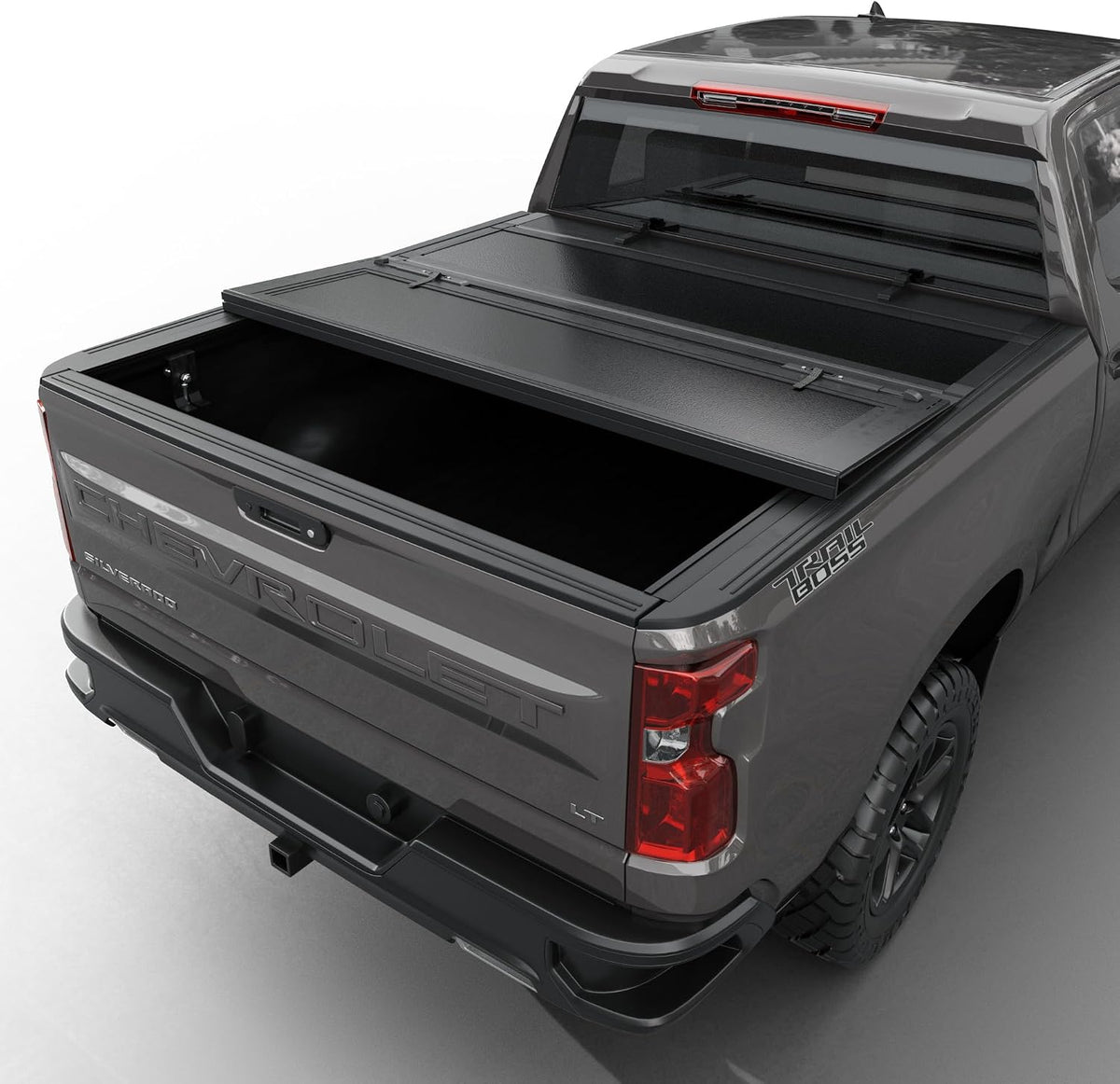 tutel low profile hard shell flip-up truck bed shown in use