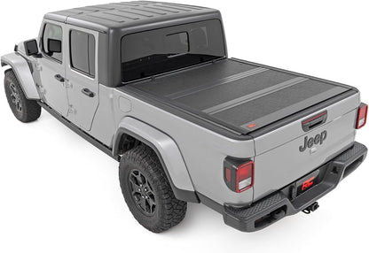 rough country hard low-profile tri-fold tonneau cover for shown in use