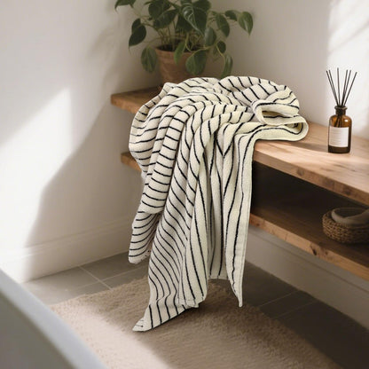 black and ivory striped bath towels set of shown in use