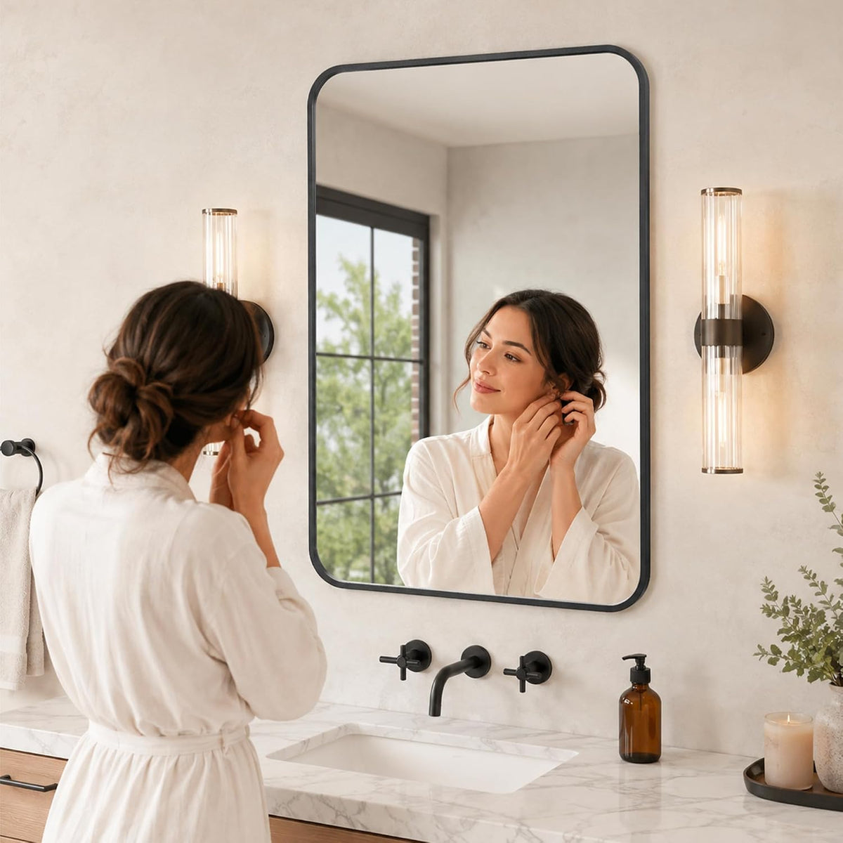 24x36 inch matte black rounded rectangle vanity mirrors shown in use