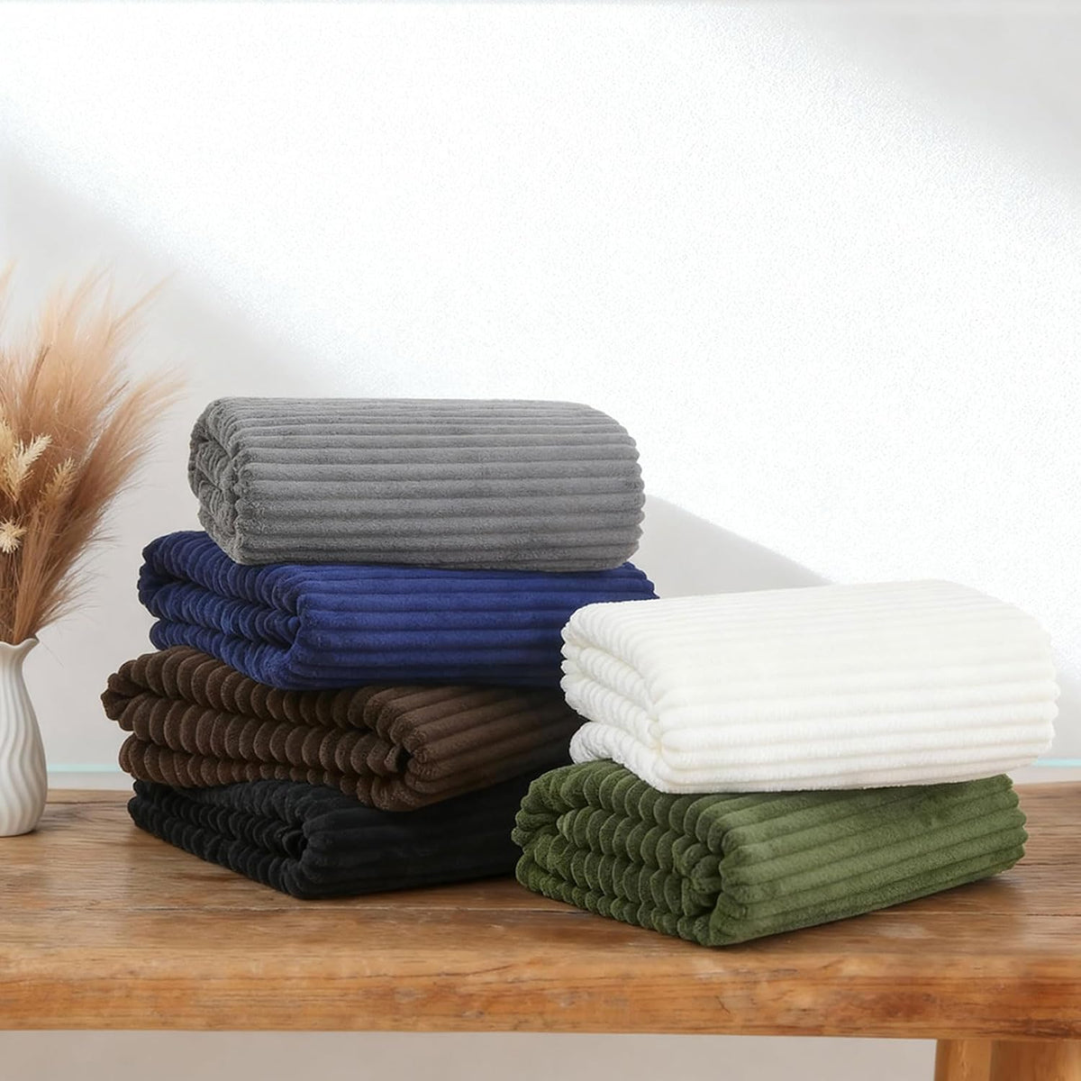 bath towel set, 40"x80" oversized bath sheets, olive on a desk or shelf