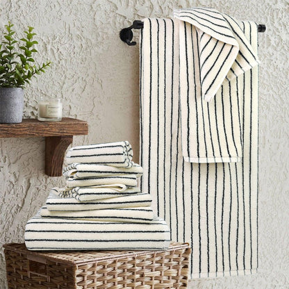 8 piece black and ivory towel set, super shown in use