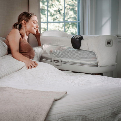 chicco close to you 3-in-1 bedside bassinet with shown in use