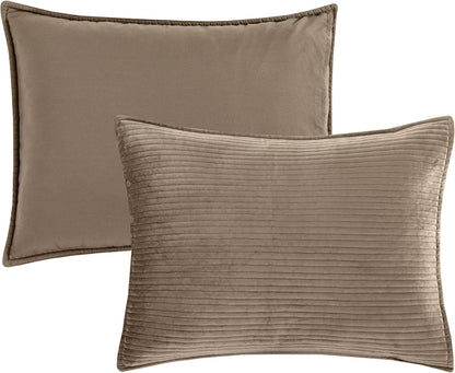 elegant comfort luxury 3-piece velvet corduroy stripe quilt on a desk or shelf