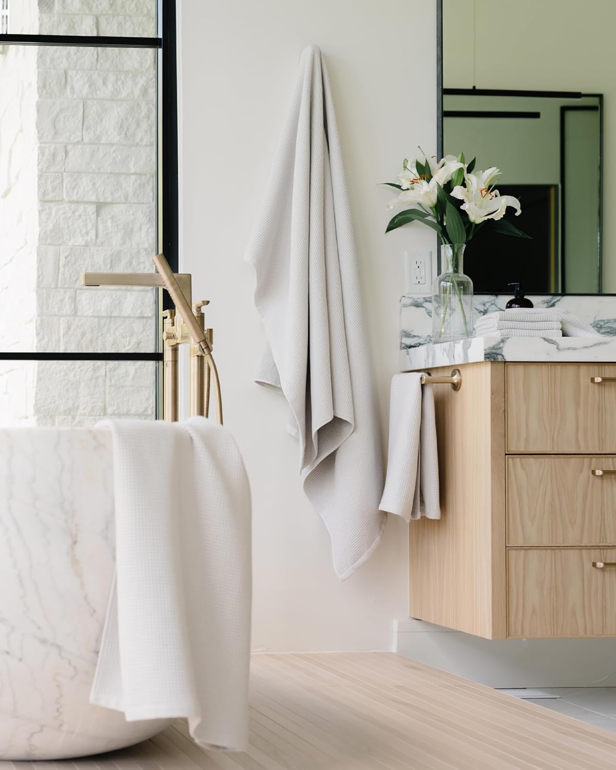cozy earth waffle bath towels, mini textured waffle shown in use
