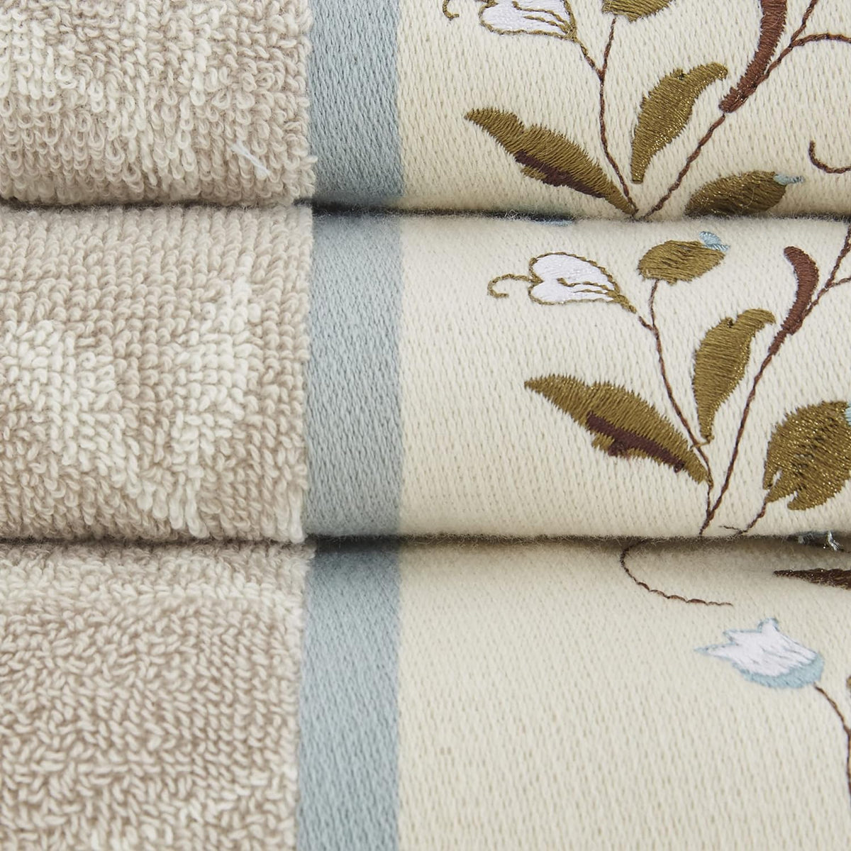 madison park serene 100% cotton bath towel set on a desk or shelf