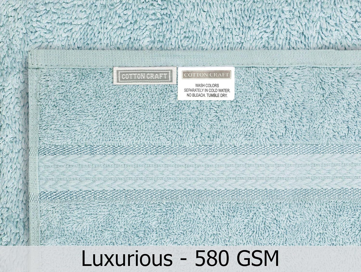 cotton craft ultra soft 6 piece towel set on a desk or shelf